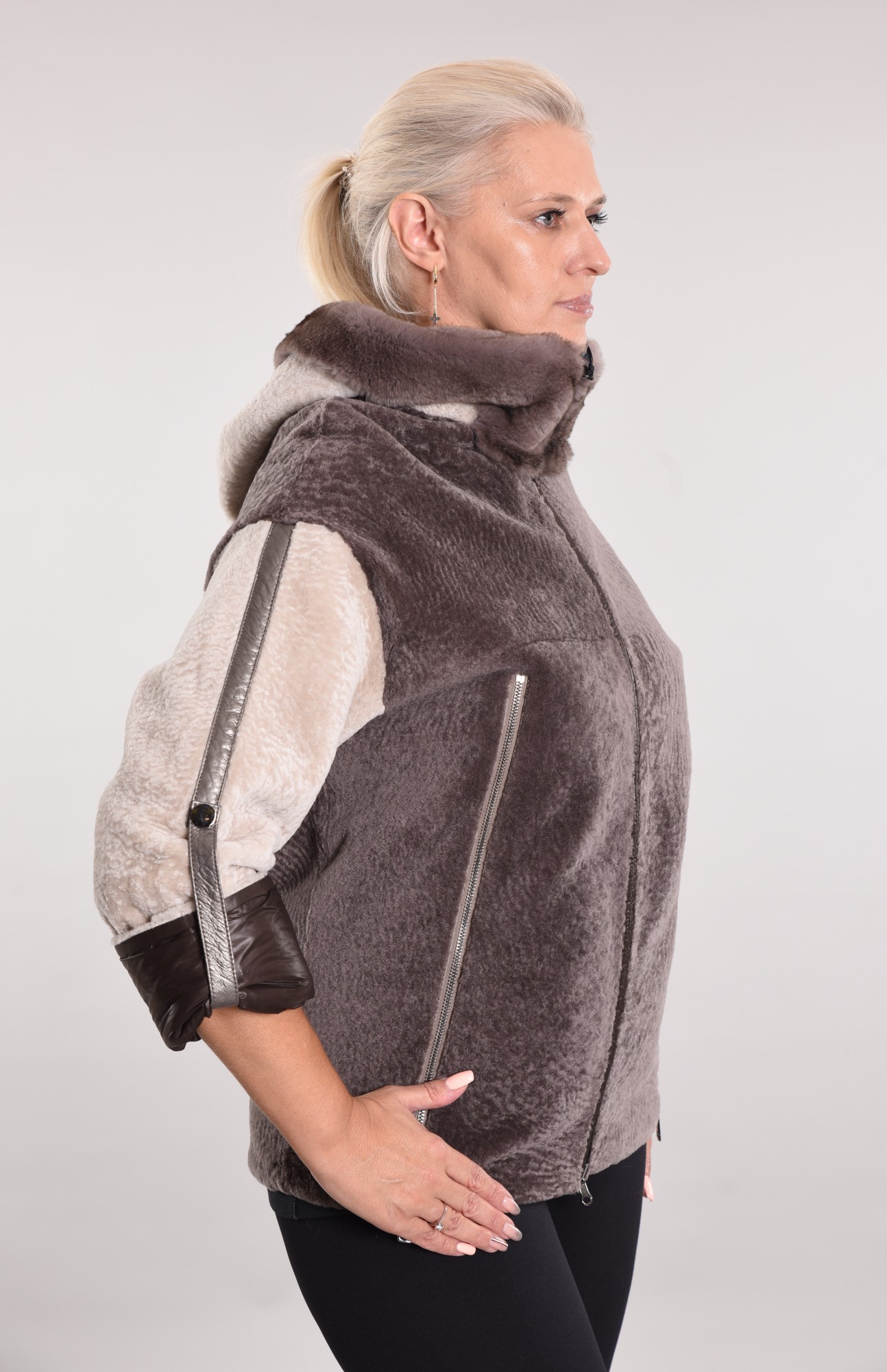 Astragan lined, on the edge of the hood Rex