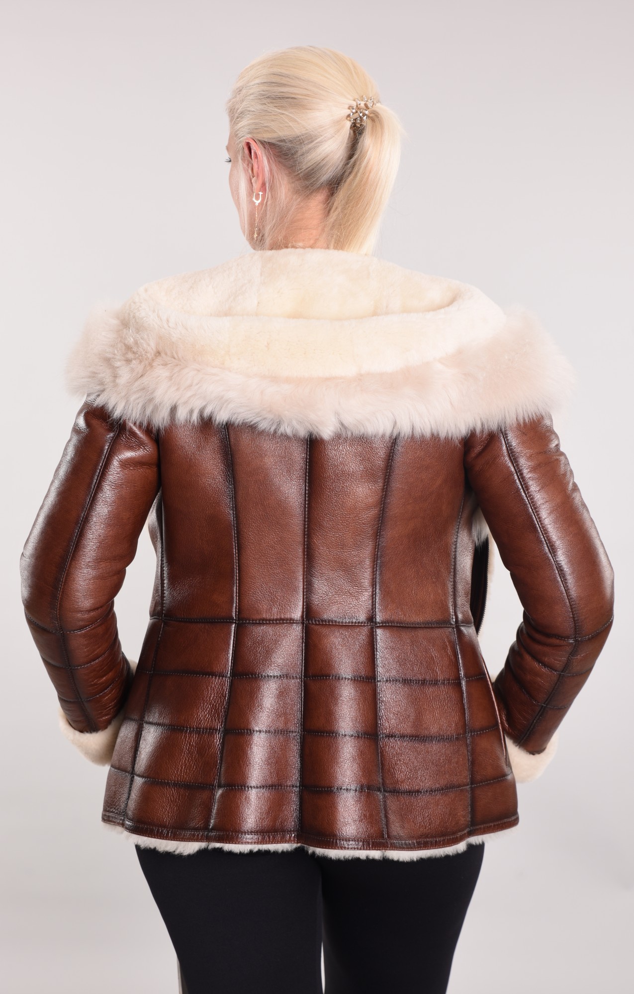 Coated sheepskin coat with hood