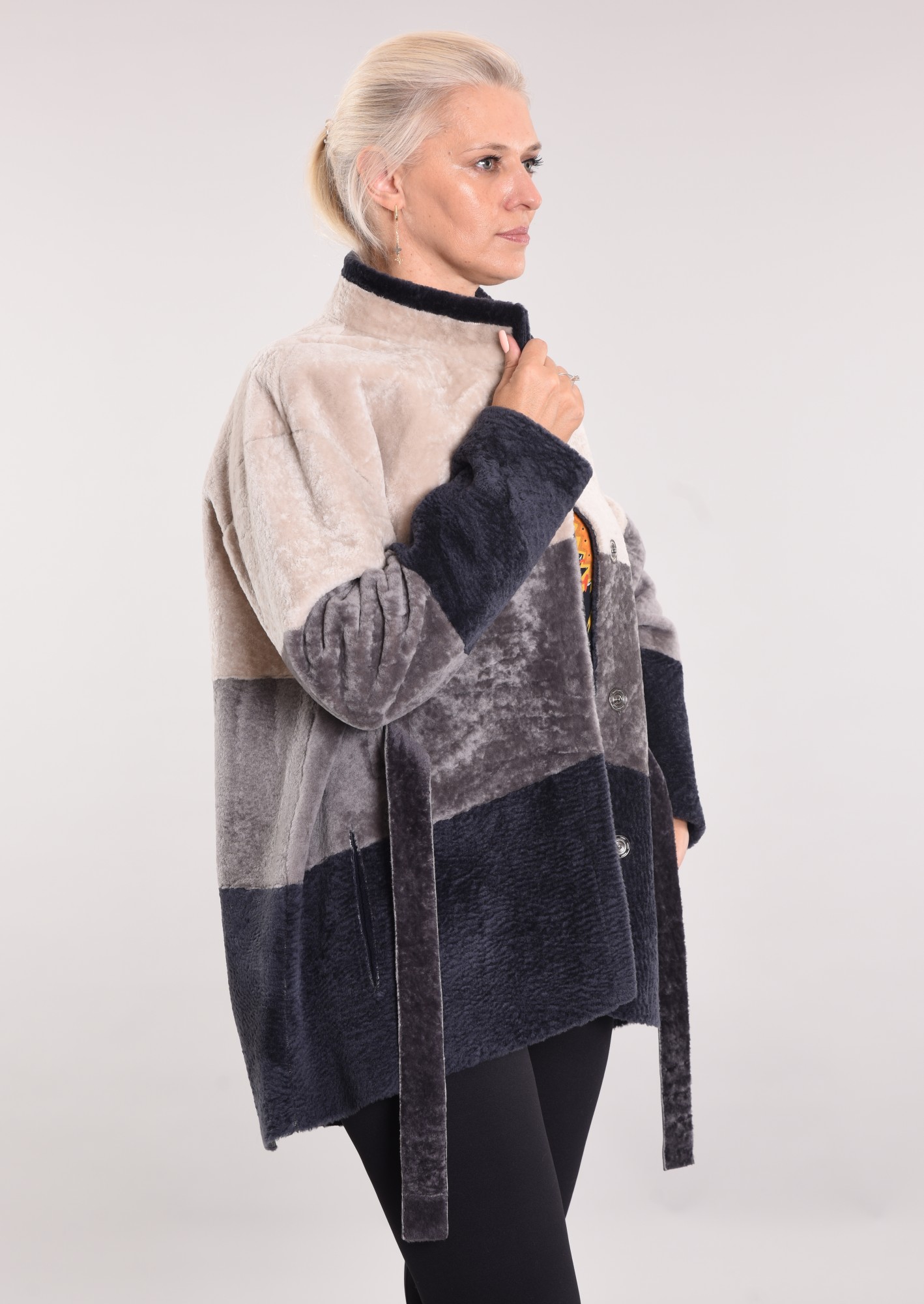 Astragan reversible with a hood