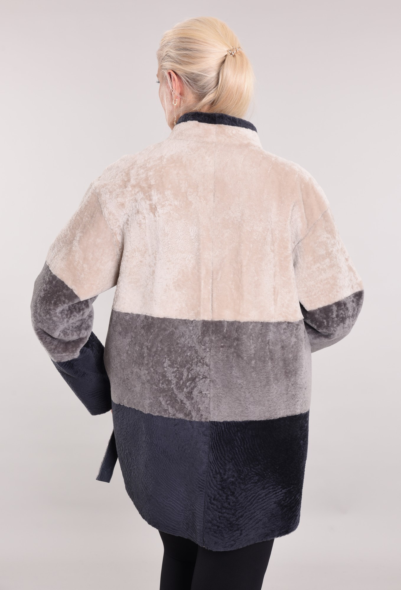 Astragan reversible with a hood