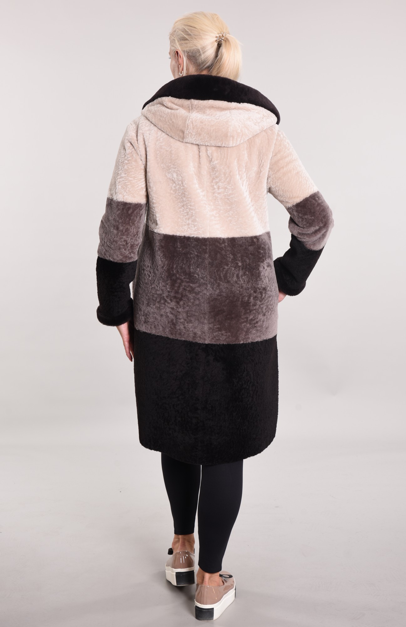 Astragan reversible with a hood