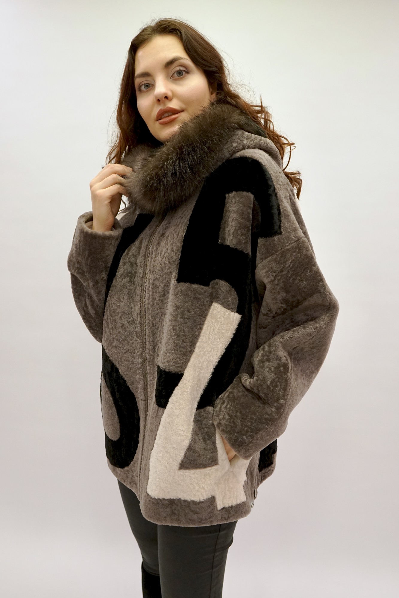 Astragan is a reversible model with a coating, Arctic fox along the edge of the hood