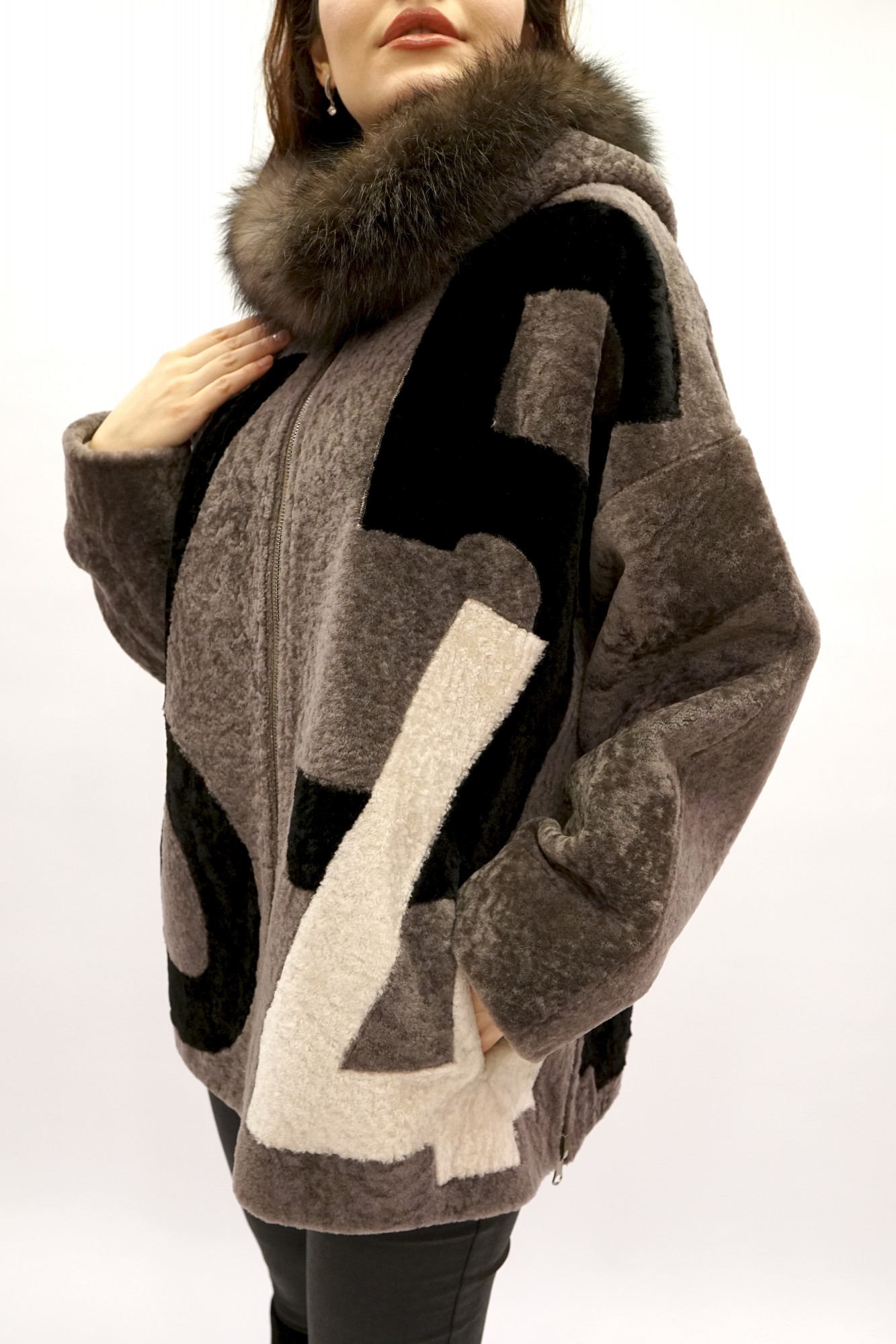 Astragan is a reversible model with a coating, Arctic fox along the edge of the hood