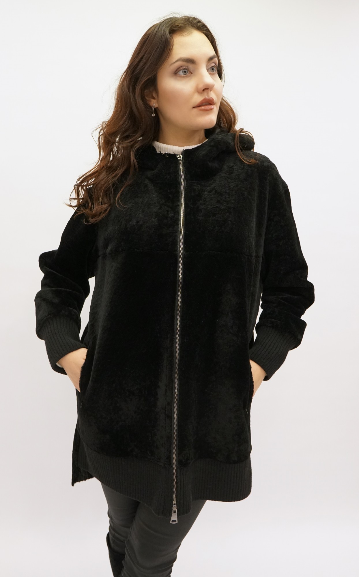 Astragan with a cover and a hood. Jersey cuffs and hem