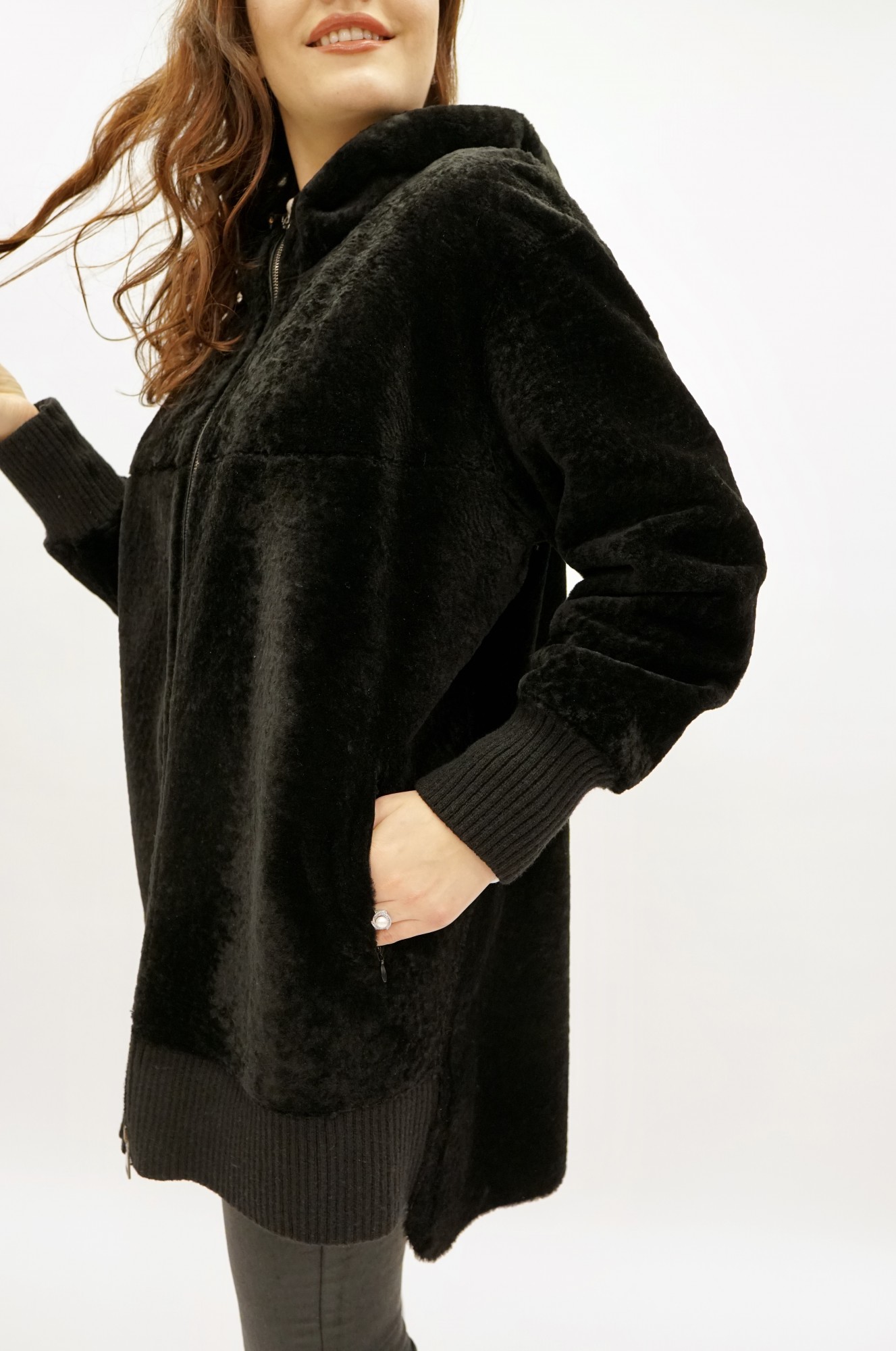 Astragan with a cover and a hood. Jersey cuffs and hem