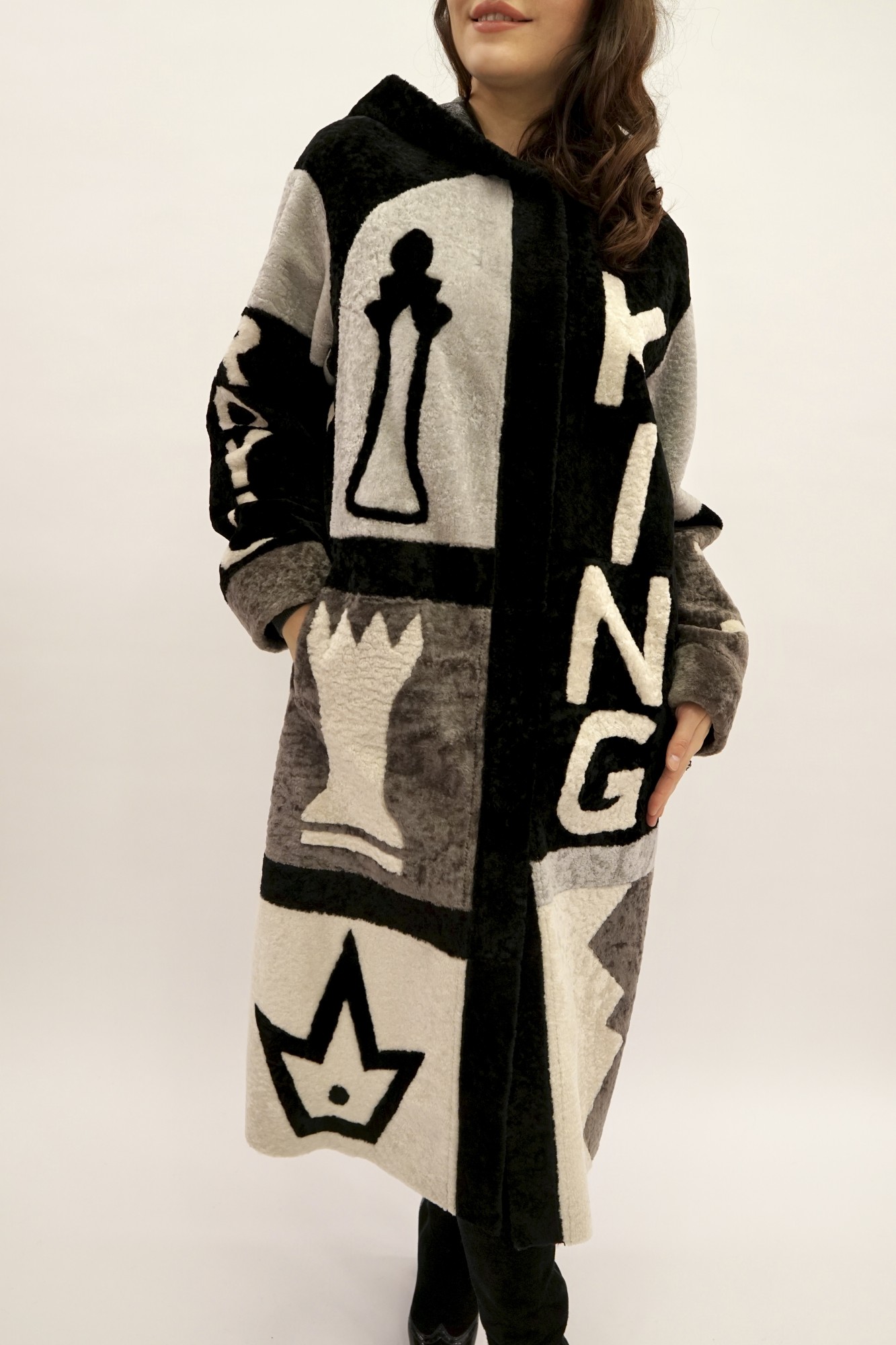 Astragan with a cover and a hood. Oversize