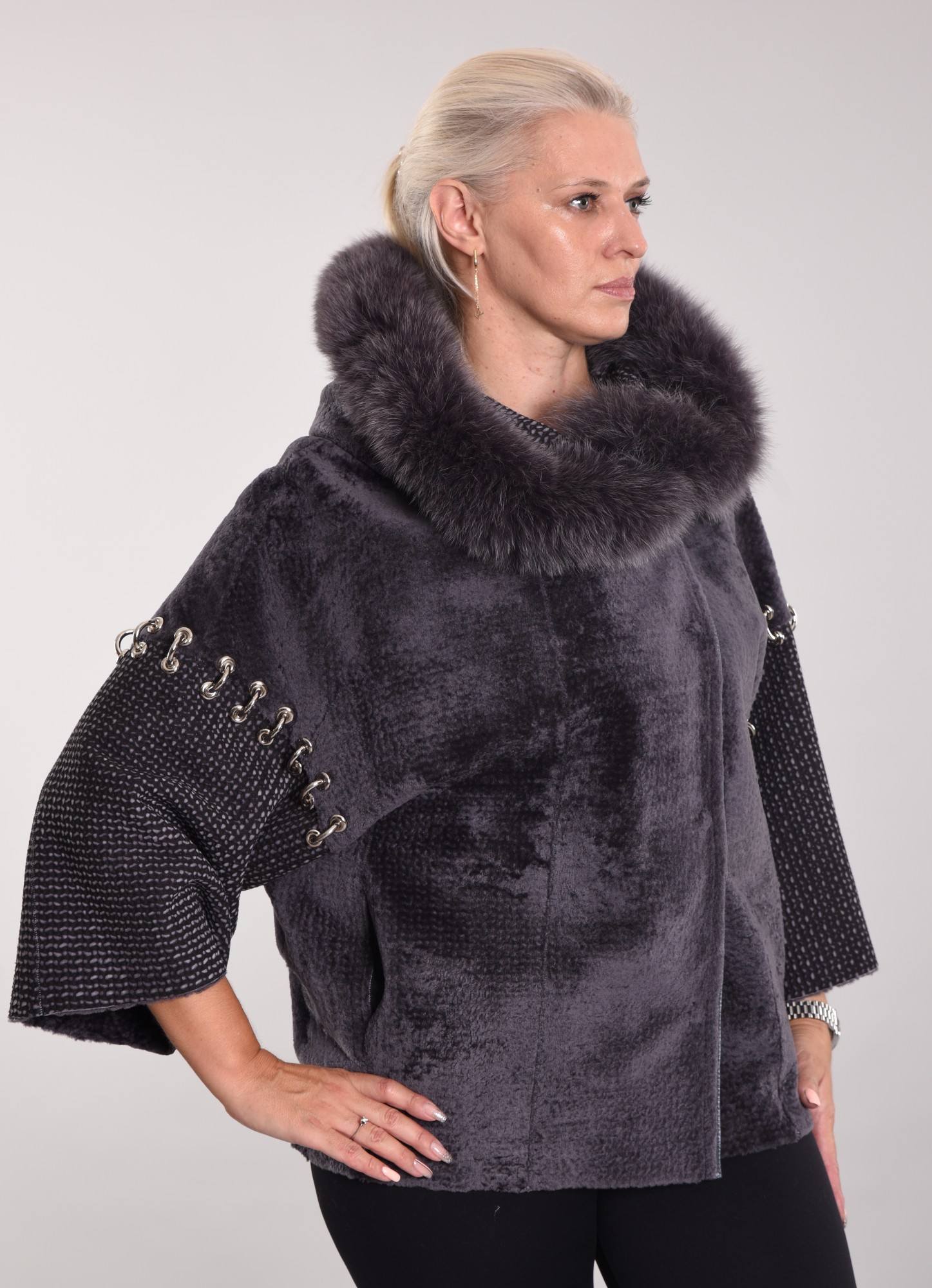 Astragan with coating, arctic fox along the edge of the hood