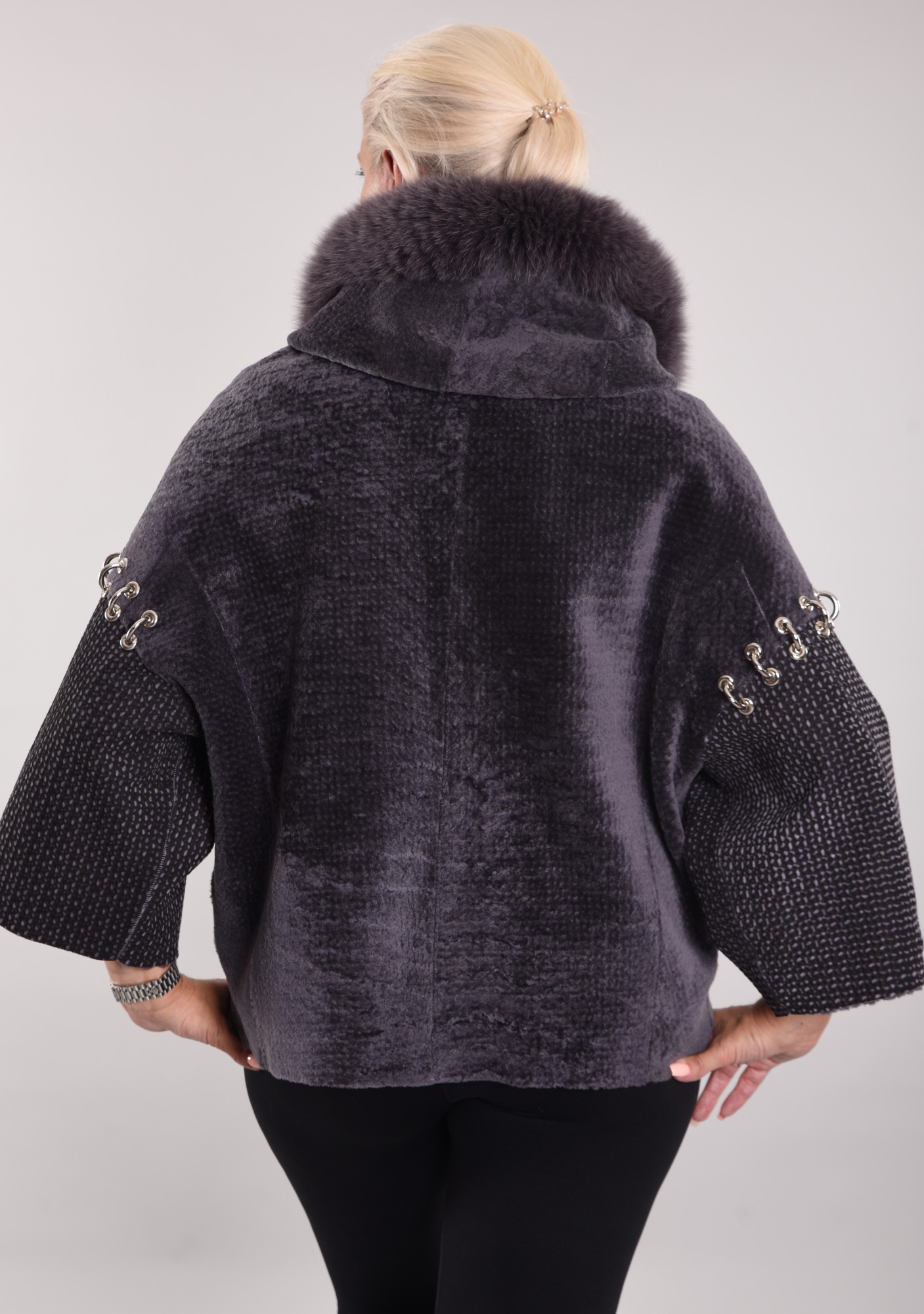 Astragan with coating, arctic fox along the edge of the hood