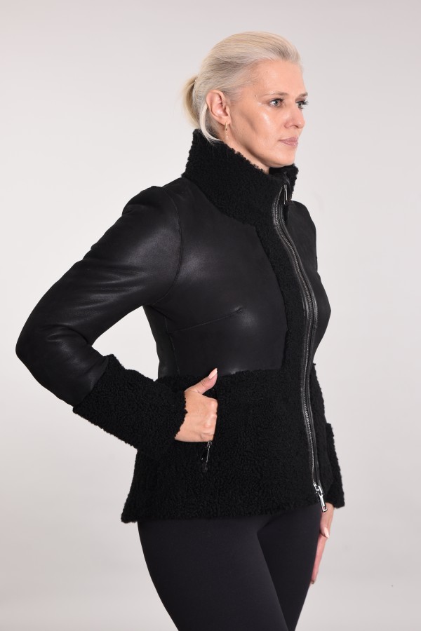 Coated sheepskin coat with curly elements