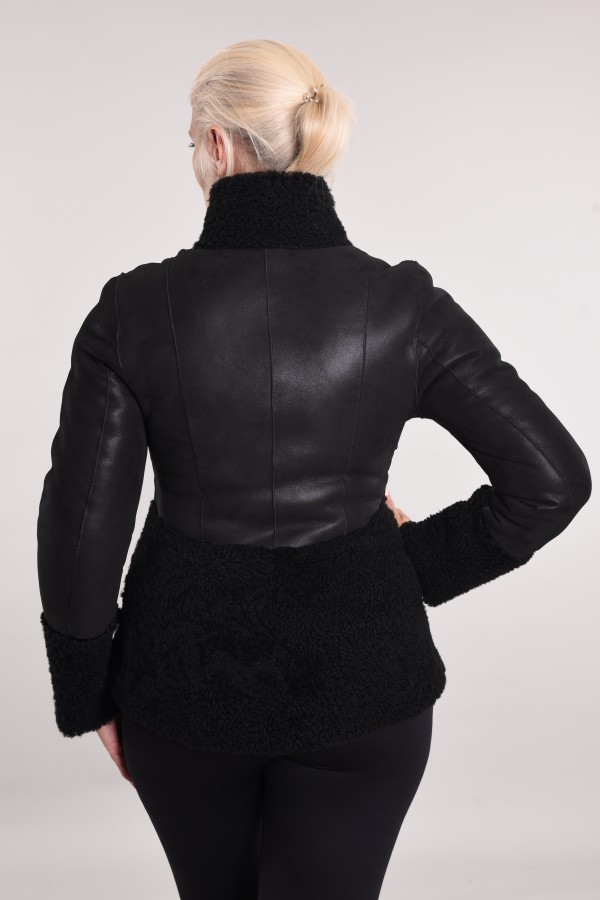 Coated sheepskin coat with curly elements