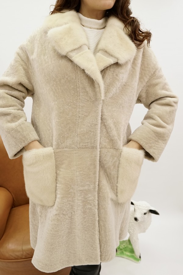 Astragan coated reversible design, English collar and patch pockets mink