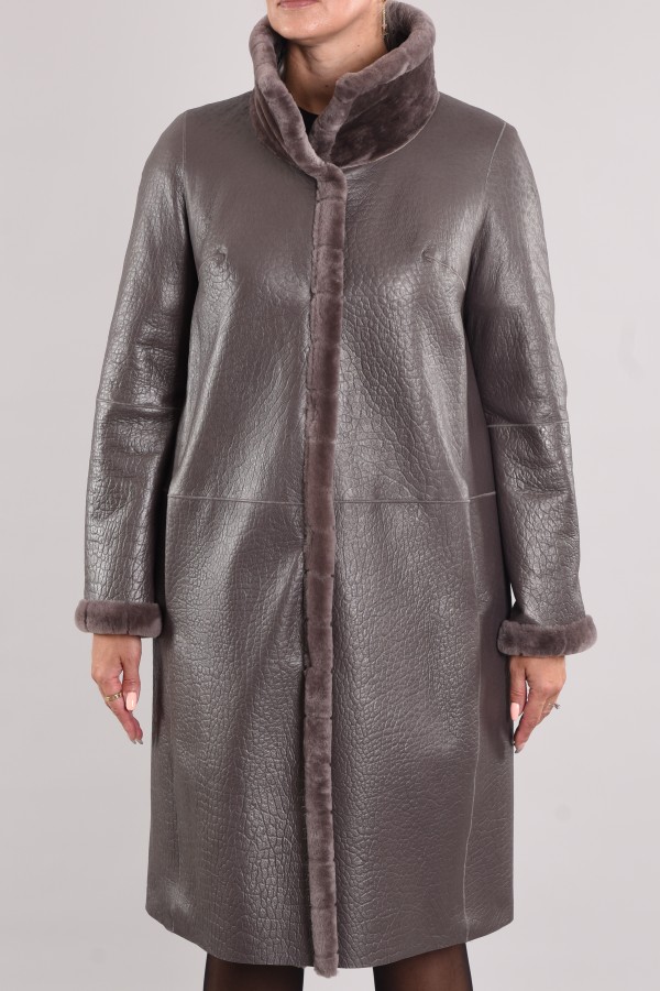 Astragan reversible coated on the edge of the product muton